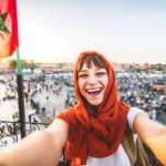happy-tourist-visiting-jamaa-el-fna-market-morocco